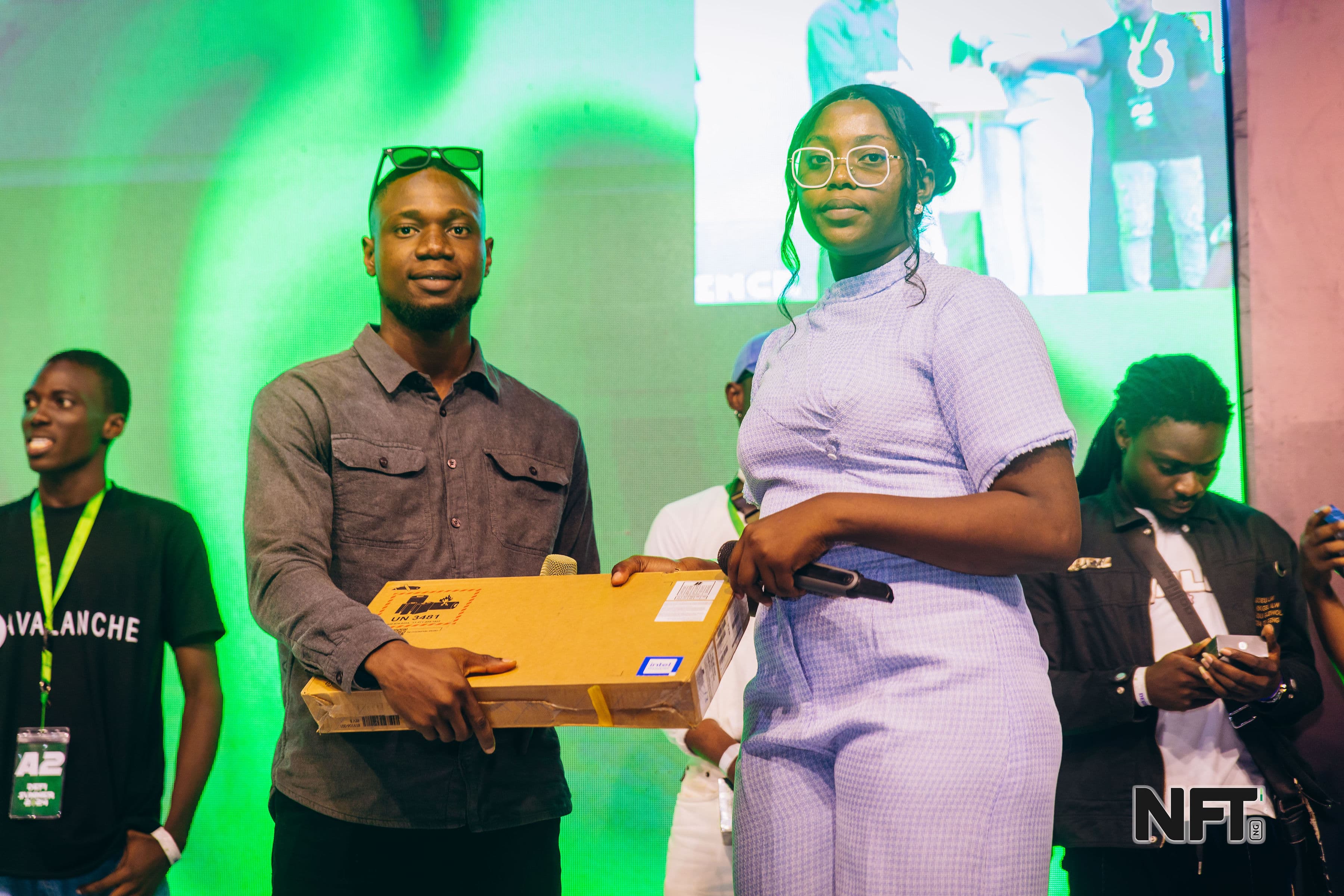 Awarding a prize to one of the beneficiaries during DeFi Summer 2024