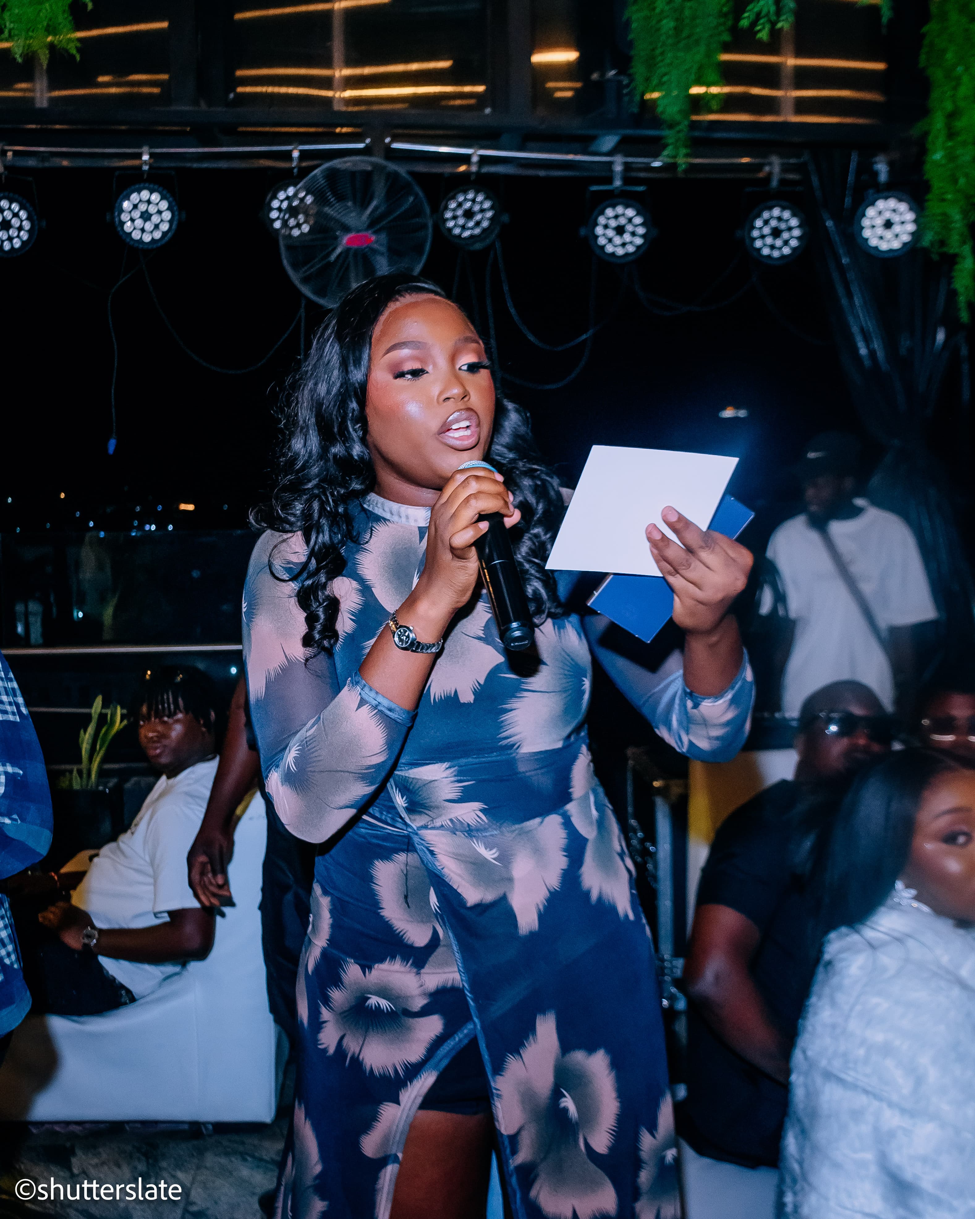 Amahra addressing the audience at Sunset Soiree